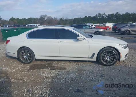 2019 BMW 740I из США, поврежденный, VIN WBA7E2C55KB216501